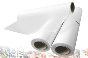 Textile DTF film with printed colorful designs ready for heat transfer application